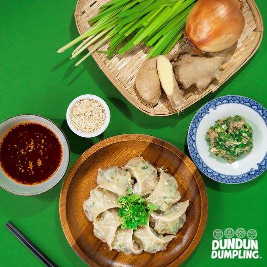 pork w chives dumpling. cooked dumpling. from top