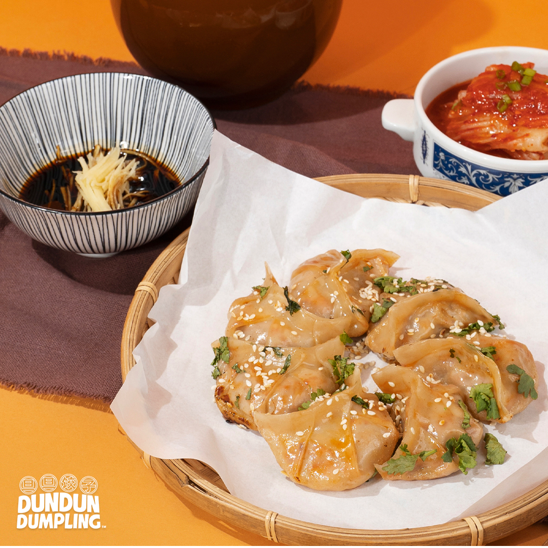 pork w kimchi dumpling. cooked dumpling. from side