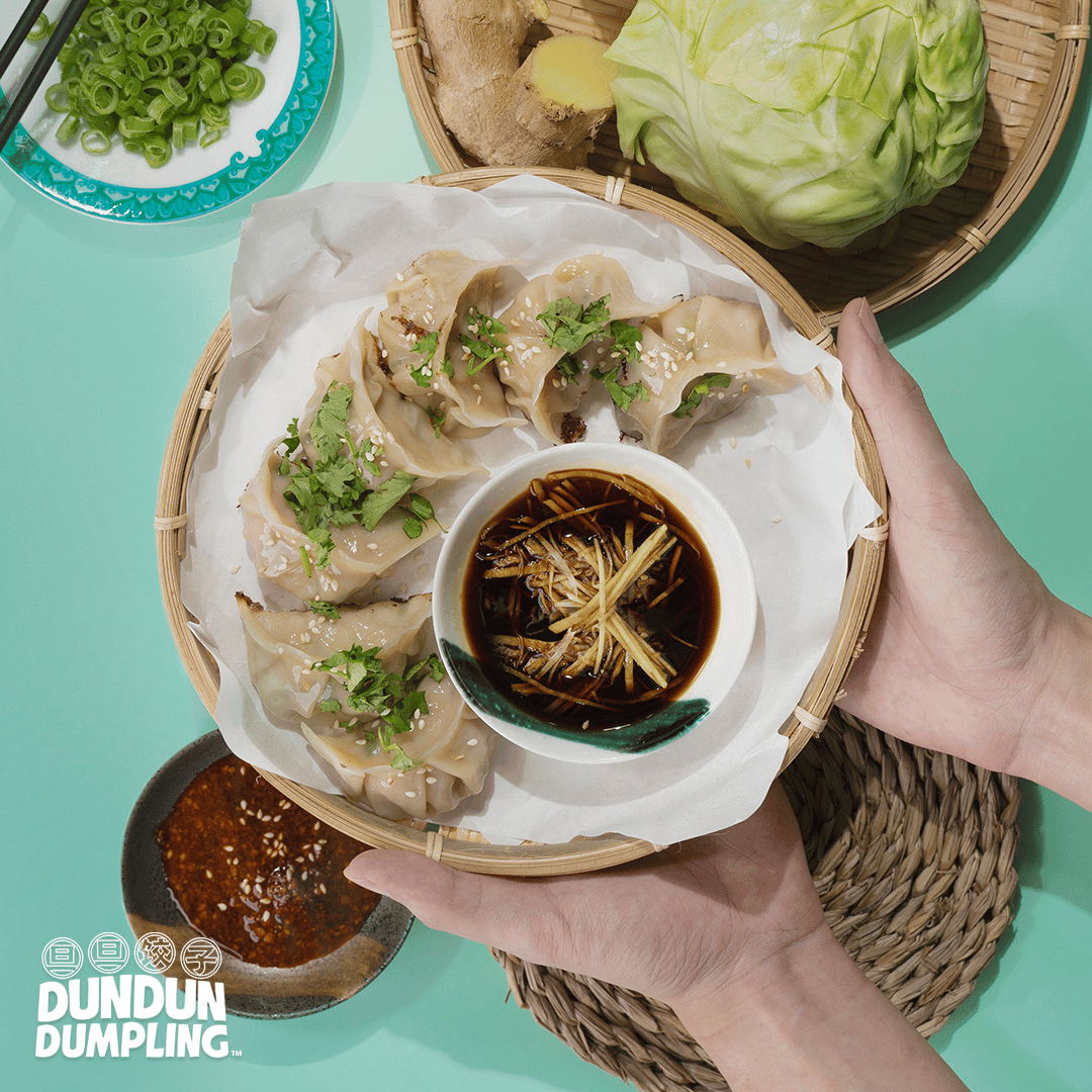 pork w cabbage dumpling. cooked dumpling. from top