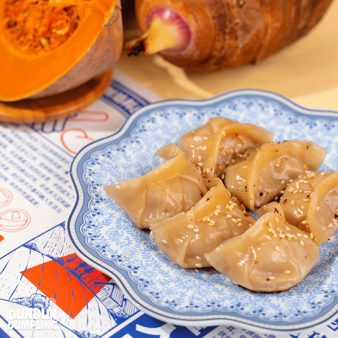 yam & pumpkin dumpling. cooked dumpling. from side