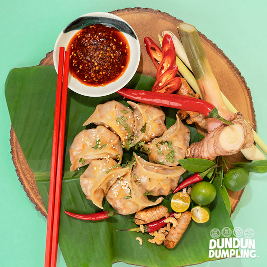 pork w tomyum dumpling. cooked dumpling. from top