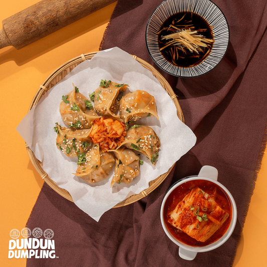 pork w kimchi dumpling. cooked dumpling. from top