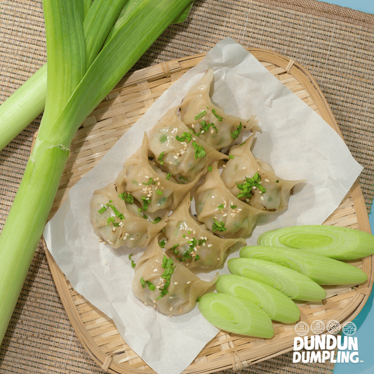 pork w leeks dumpling. cooked dumpling. from top